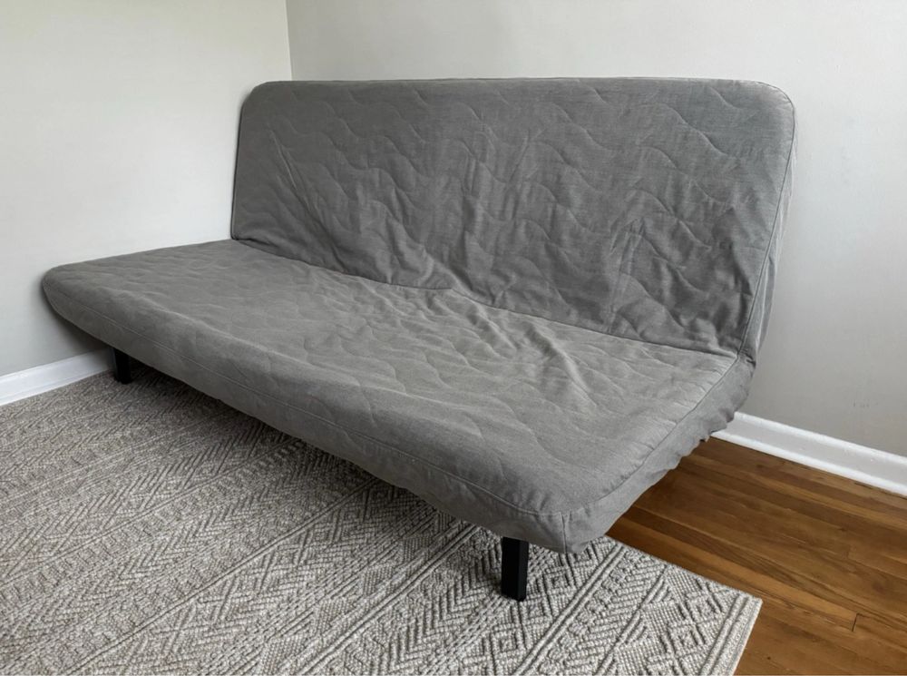 Sofá-cama e capa lavável com colchão de espuma NYHAMN