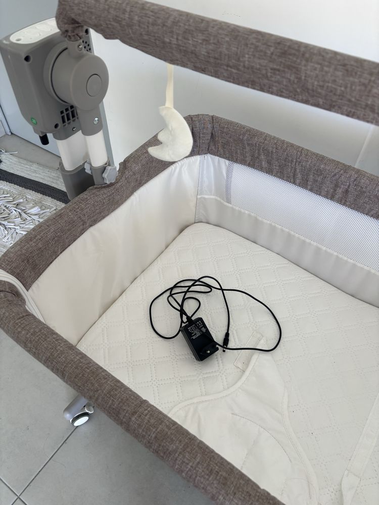 Cama de bebé eletrónica