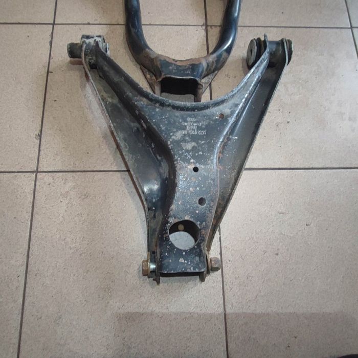 Wahacz Dolny Lewy tył VW Passat B5 Audi A6 C5 Lift Quattro