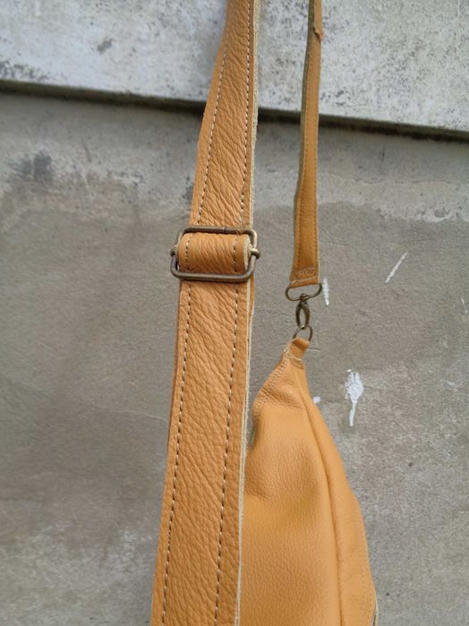 Artystyczna skórzana nerka z kotem. Handmade