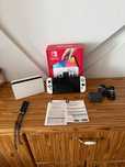 Konsola Nintendo Switch OLED Biała + Akcesoria + Karta Pamięci 64GB