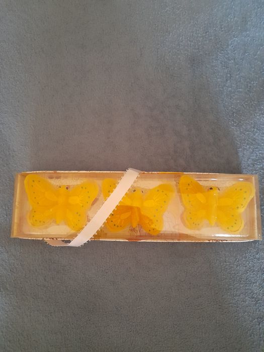 Velas em forma de borboleta