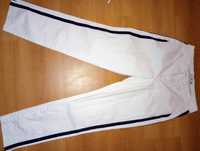 Białe spodnie AJC z lampasami roz 34 bdb