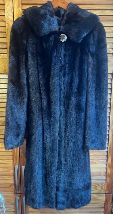 Норкова шуба нова