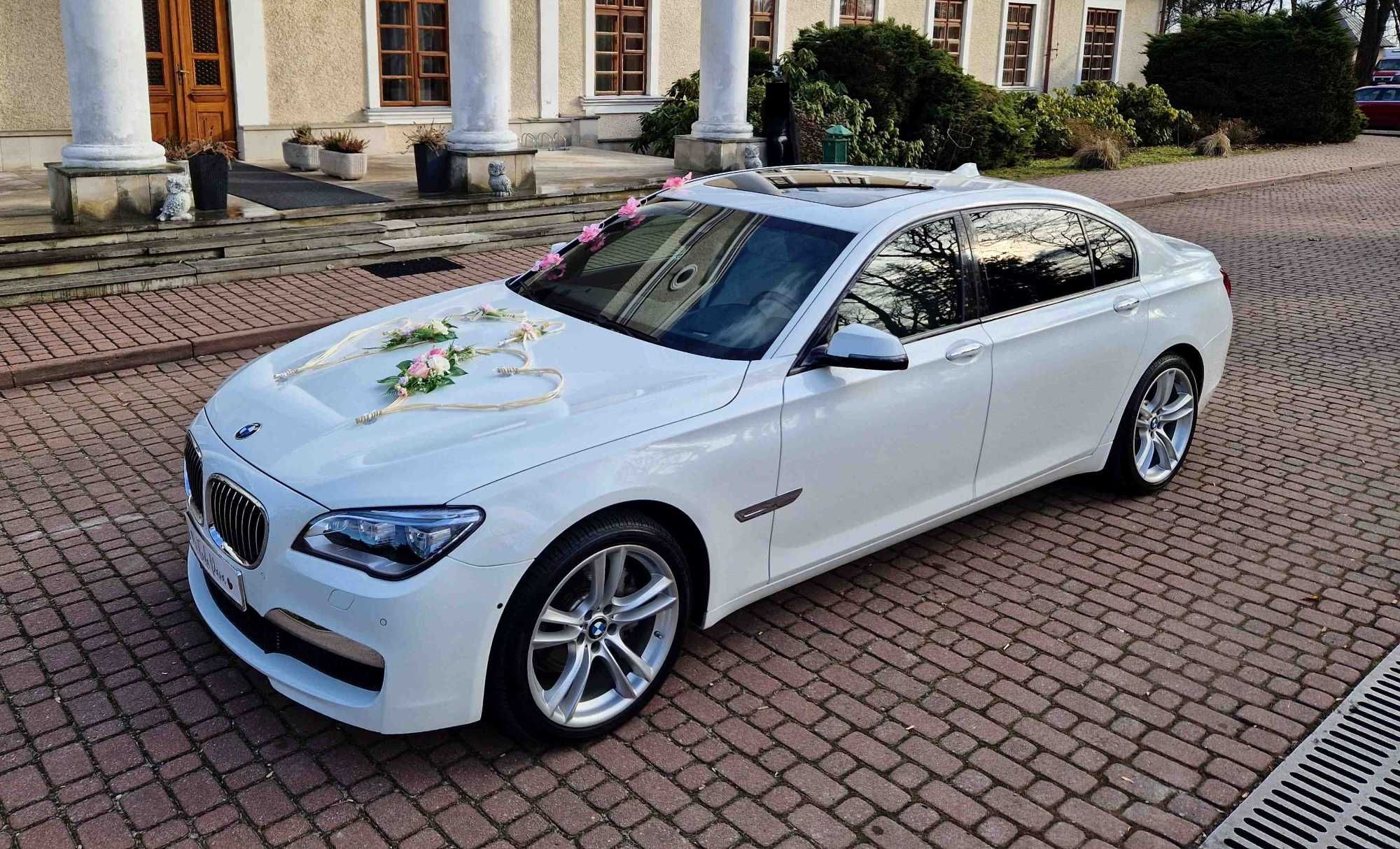 Białe auto do ślubu BMW Serii 7 F01 / F02 Wynajem Ślub białe BMW F02