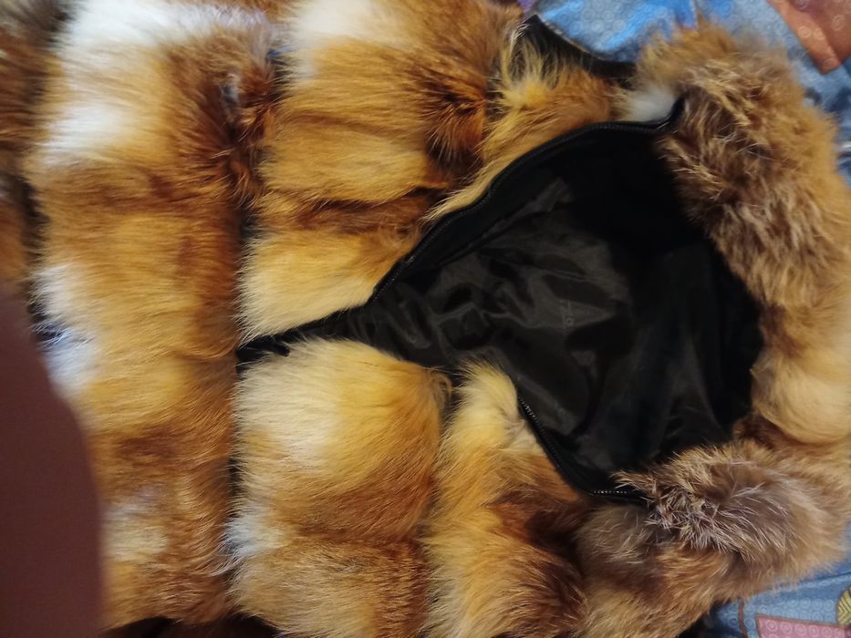 жiноча хутряна безрукавка