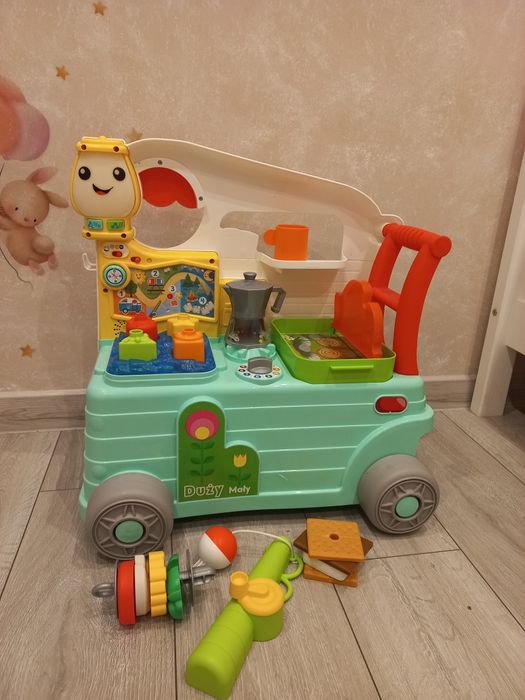 Wesoły kamper jeździk pchacz dla malucha Fisher - Price