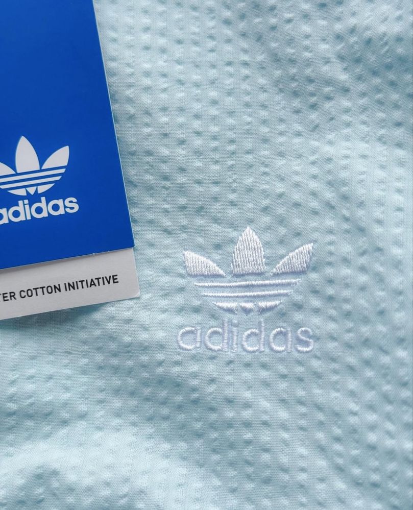 Бавовняний комбінезон від Adidas Originals ніжно голубий