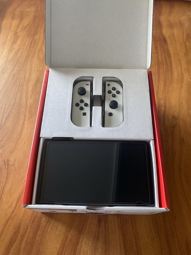 Nintendo switch OLED, mala de transporte, MarioKart 8 e pro controller