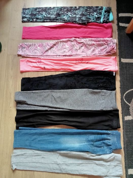 18 par  leginsów w różnych kolorach i wzorach na 8 - 10 lat