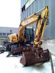 Колісний екскаватор Caterpillar M313 Свіжий 1854 мг повноповоротний