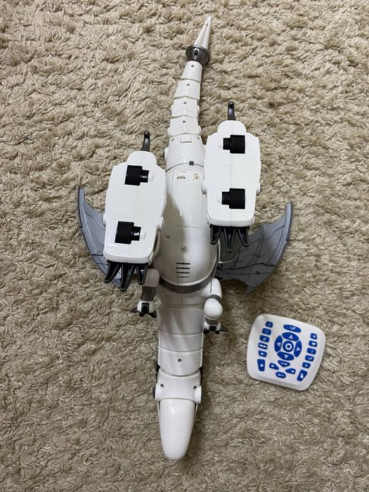 Робот динозавр з пультом