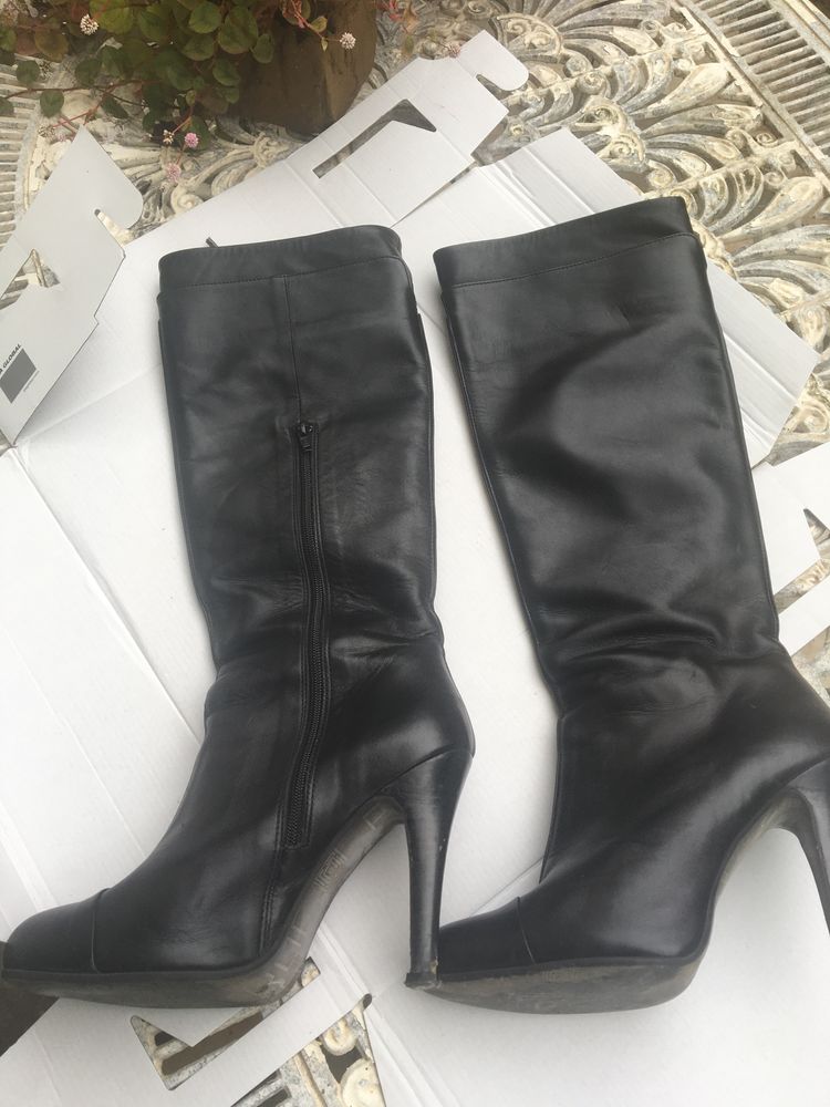 Botas de Cano e salto alto