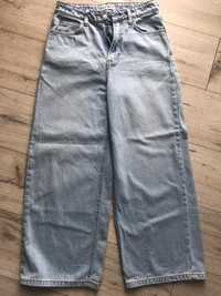 Błękitne jeansy Cropp 36