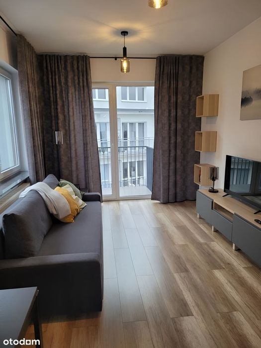 Dwupokojowe mieszkanie z balkonem i garażem blisko centrum