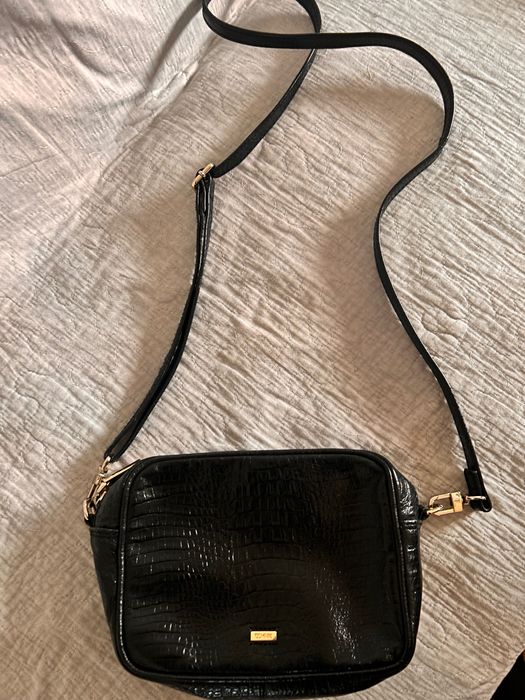 Mała torebka na pasku Ochnik ze skóry