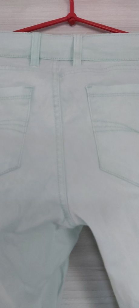 Spodnie z materiału miętowe L 40 proste  esmara