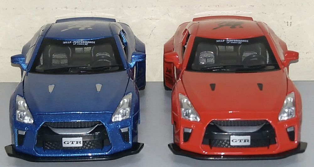 Машинка Nissan GTR модель 1:32 Автопром. Металл