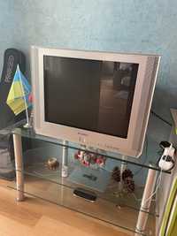 Телевізор Самсунг і склянна підставка