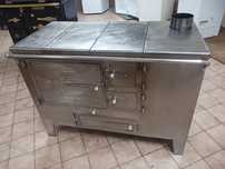 Vendo fogao em ferro inox com serpentina para aquecimento central em ó