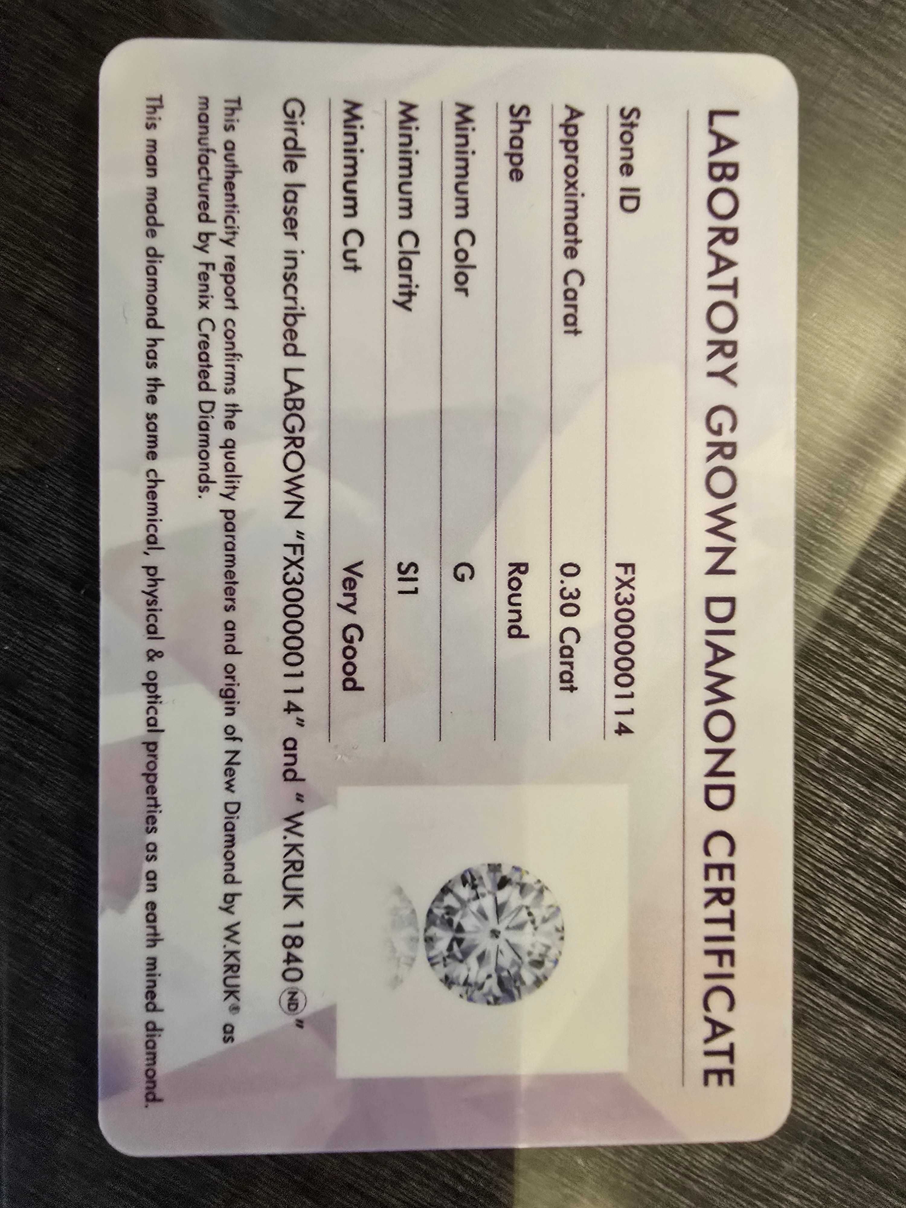 złoty pierścionek zaręczynowy W.KRUK