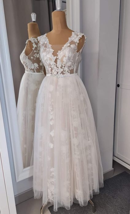 Śmietankowa suknia ślubna