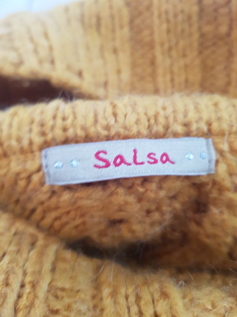 Camisola sem mangas da salsa.