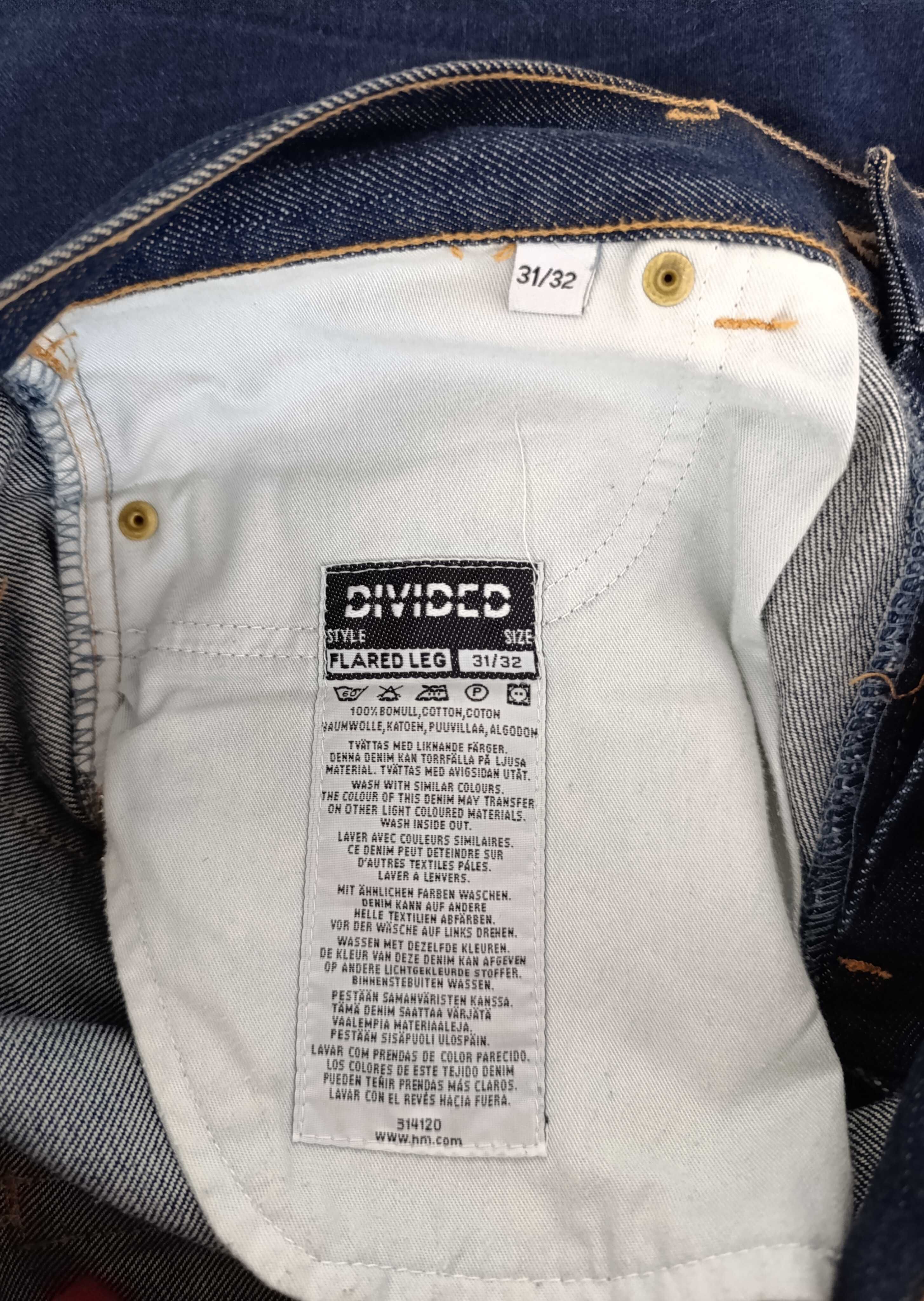 Granatowe spodnie Divided jeans dżins bawełna