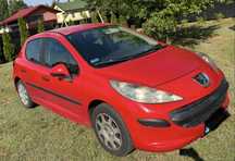 Samochod osobowy Peugeot 207 czerwony