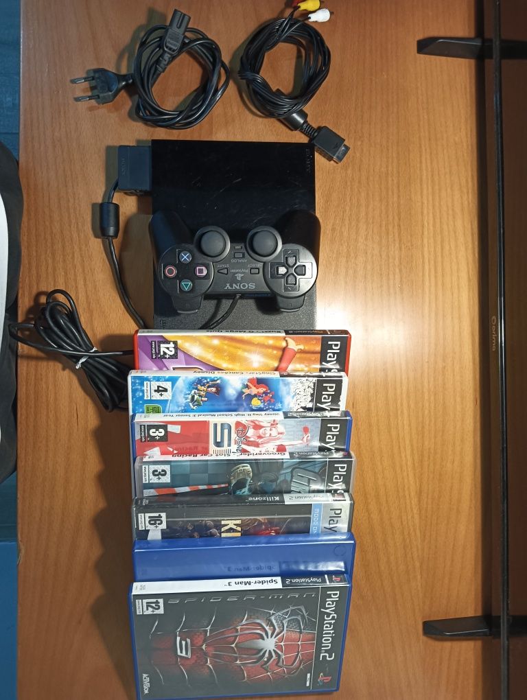 PlayStation 2 + comando original + memory card + 7 jogos (ótimo estado