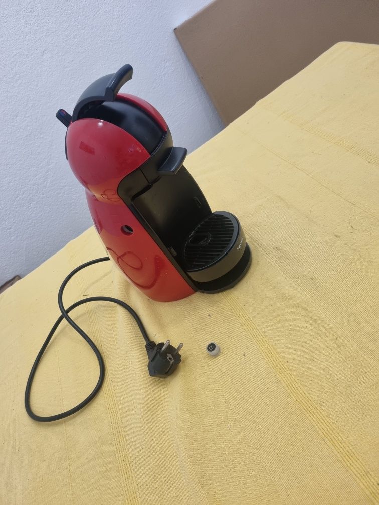 Máquina de café para arranjo problema no Botão