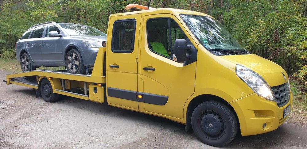 Auto laweta Pomoc drogowa 24/7 transport europa holowanie