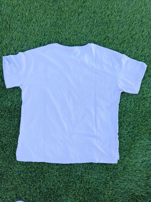 T-shirt lilás com o Stitch