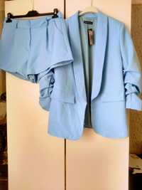 Nowy z metką niebieski garnitur damski z krótkimi spodenkami