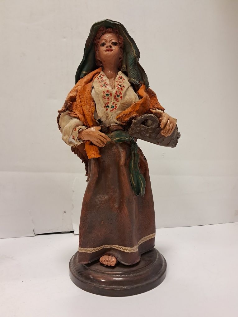 Par de figuras em barro