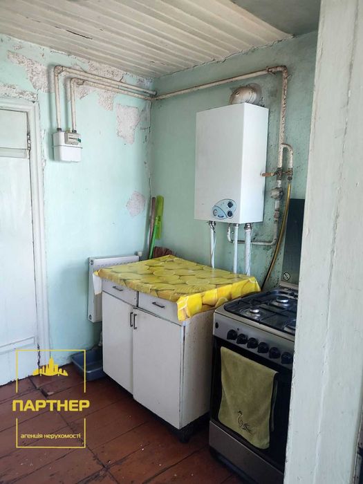 Продам  окрему  частину   будинку  у  нагірній частині Кременчука