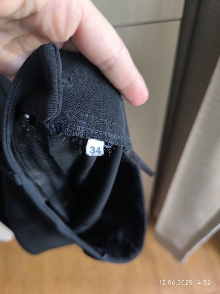 Czarne eleganckie spodnie szerokie migawki dzwony 34