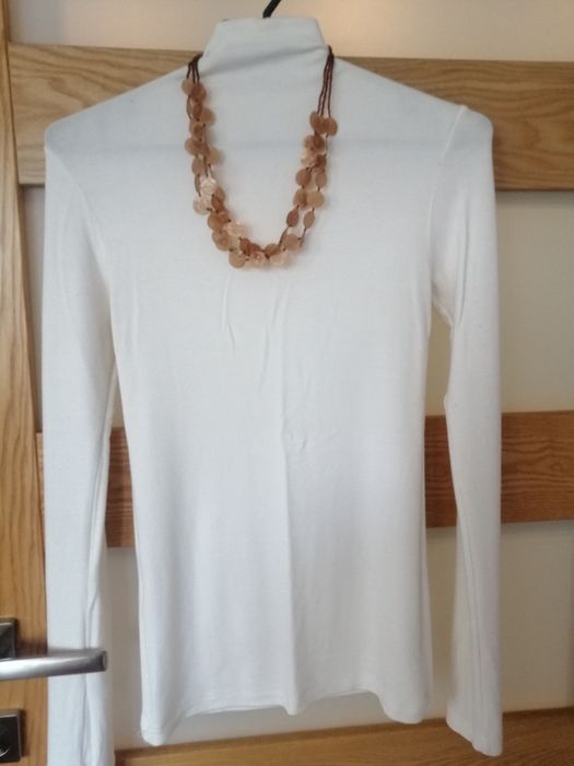 Golf ze złotymi guzikami