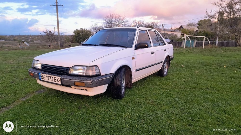 Продам Мазду 323.