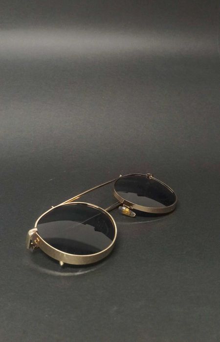 Óculos dourados novos