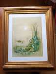 Quadro com moldura dourada