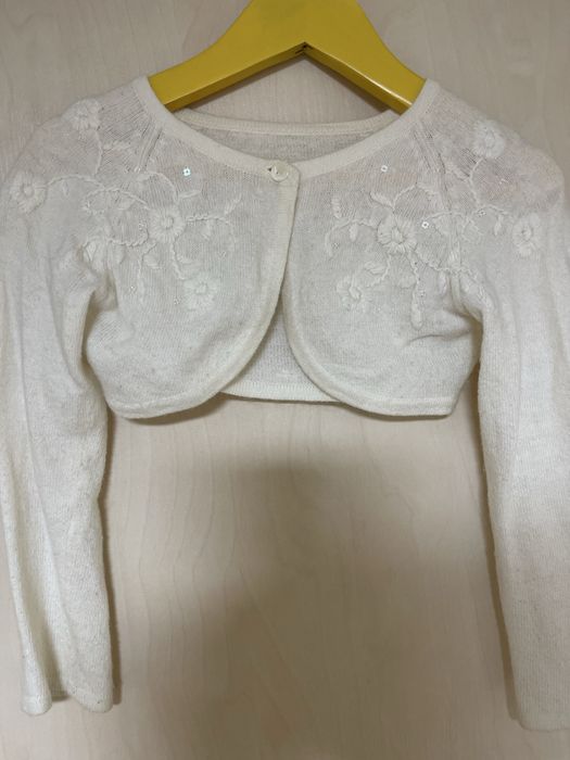 Біле болеро для дівчинки