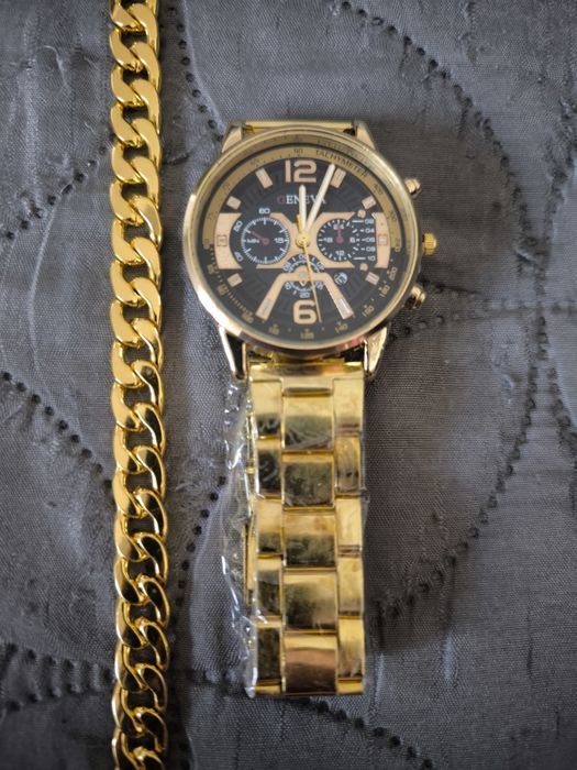 Zegarek z datownikiem i branzoleta.