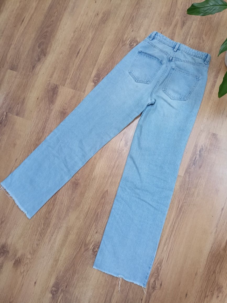 Nowe jasne niebieskie spodnie z wysokim stanem jeansy wide leg proste