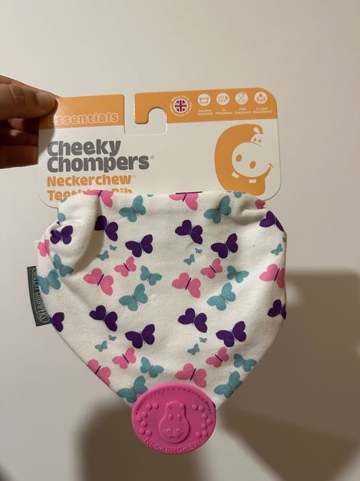 Babete com mordedor para acalmar a dor das gengivas Novo