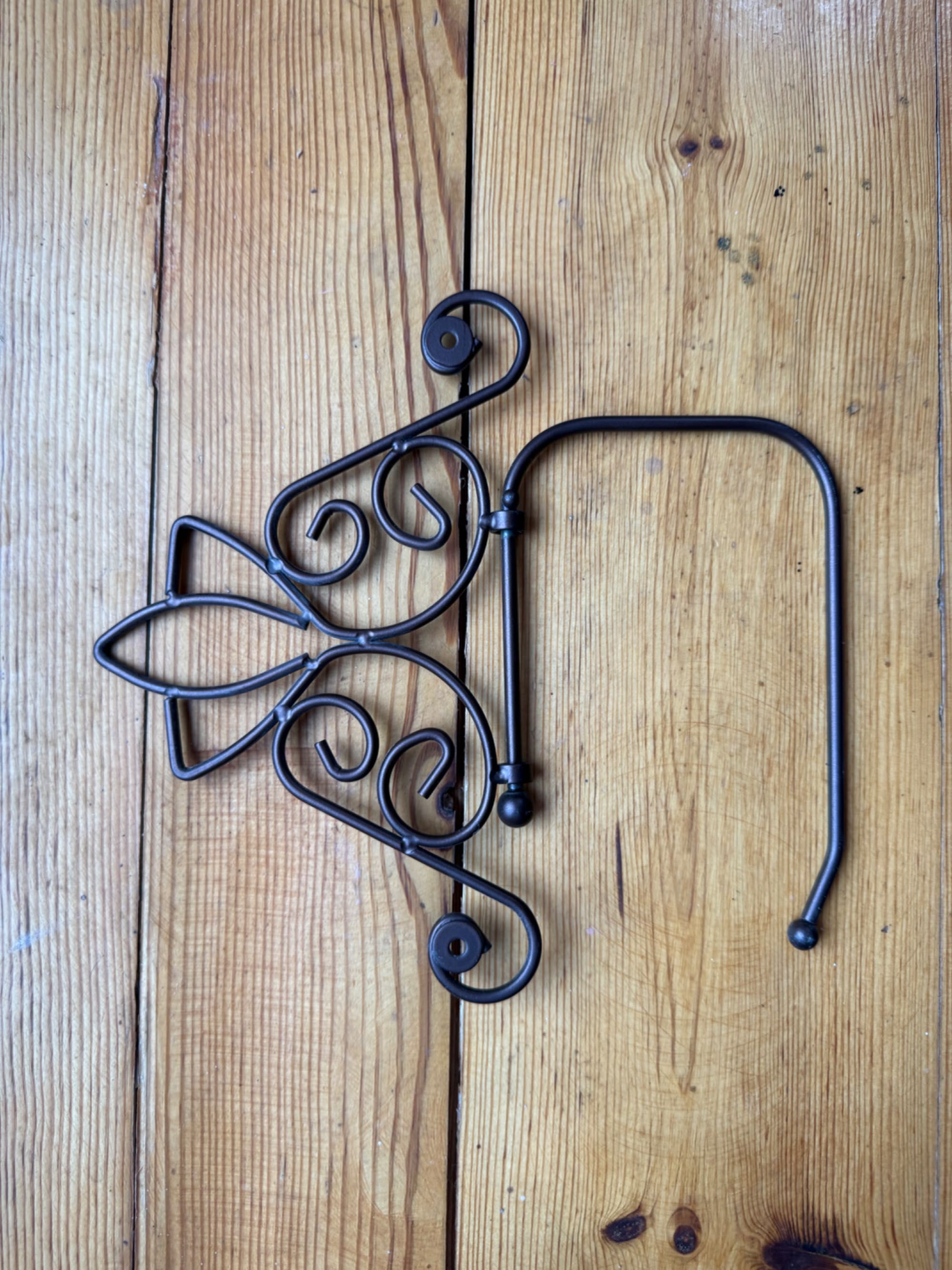 Metalowy wieszak na papier toaletowy nowy
