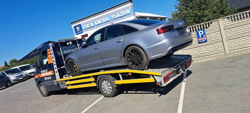 Autolaweta holowanie laweta  transport autolaweta pomoc drogowa
