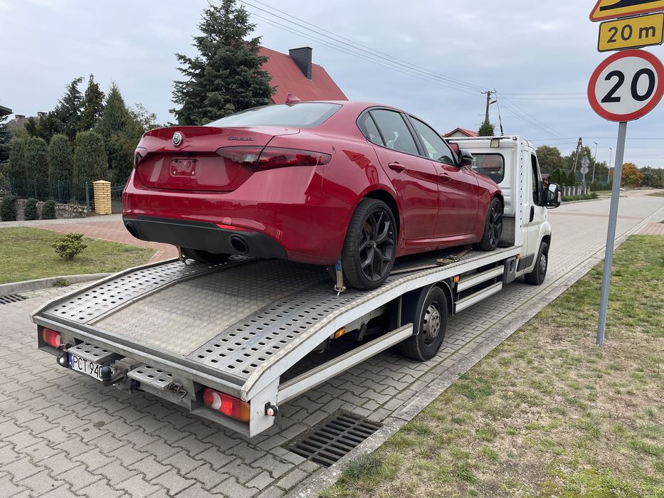 Transport Pojazdów Maszyn Holowanie Pomoc Drogowa Polska Europa