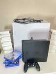 PlayStation 4 + comando + jogos