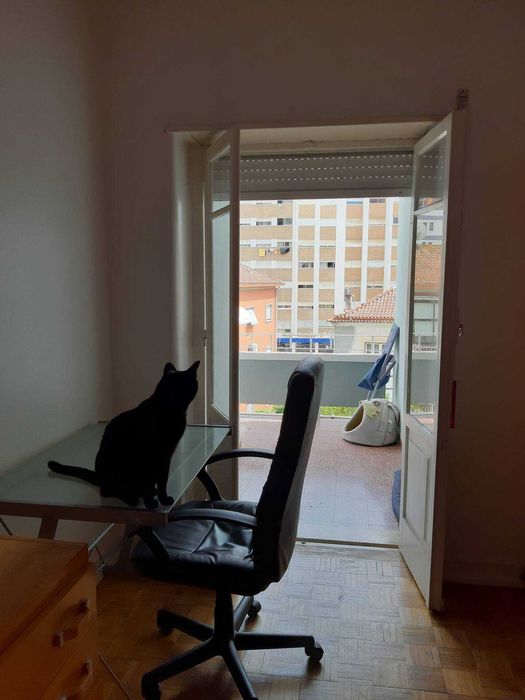 Quarto com varanda em Coimbra